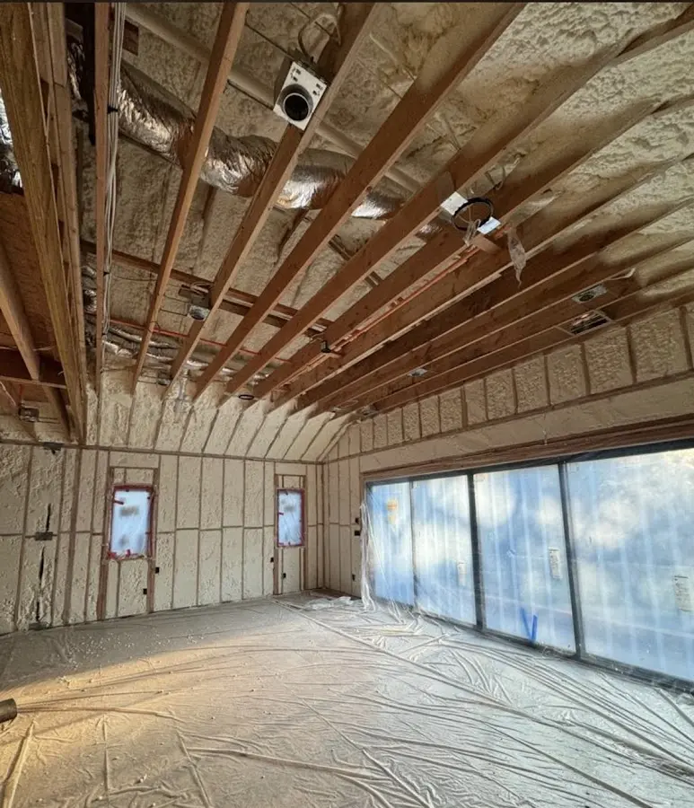 Interior walls and ceiling insulated with spray foam during new construction in Avra Valley